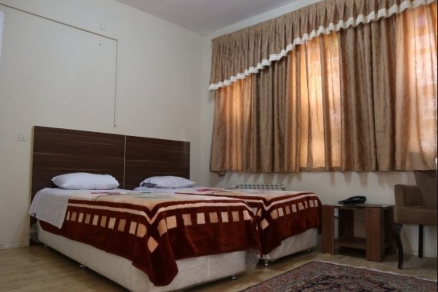 how to book Kerman Hotel