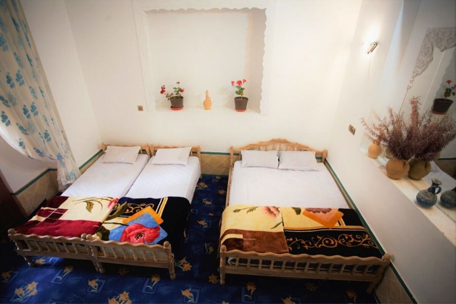 How to book Negar guest house